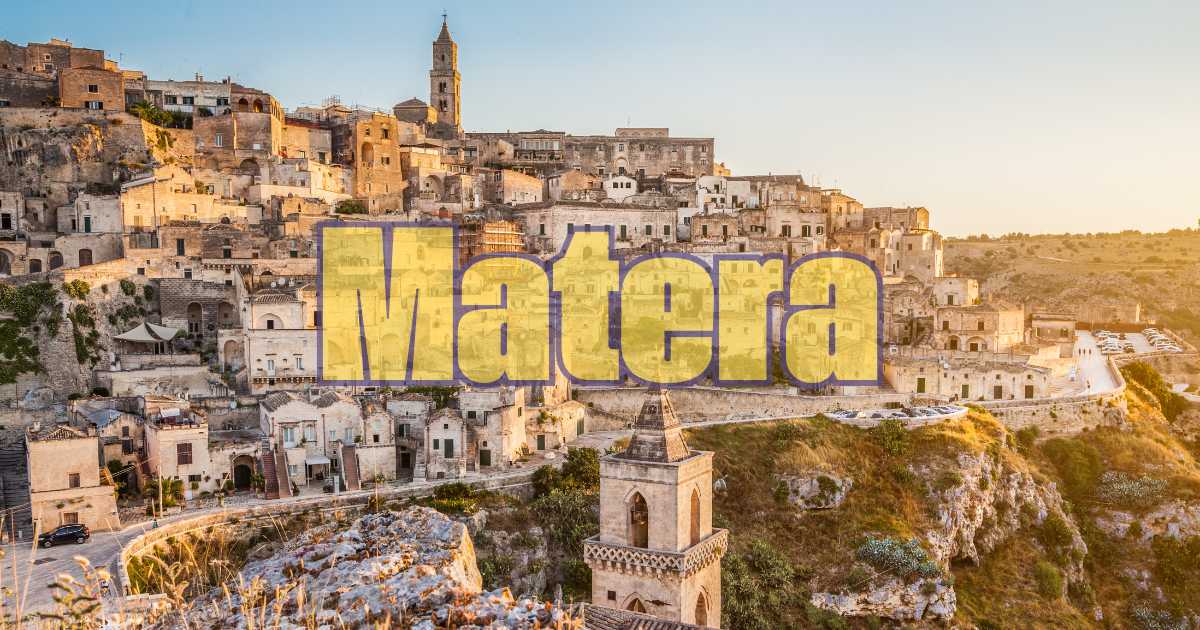 Panorama di Matera con i suoi famosi Sassi, simbolo di storia e cultura, illuminati dal sole.